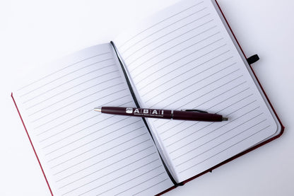 Maroon ABAI Notebook with Pen